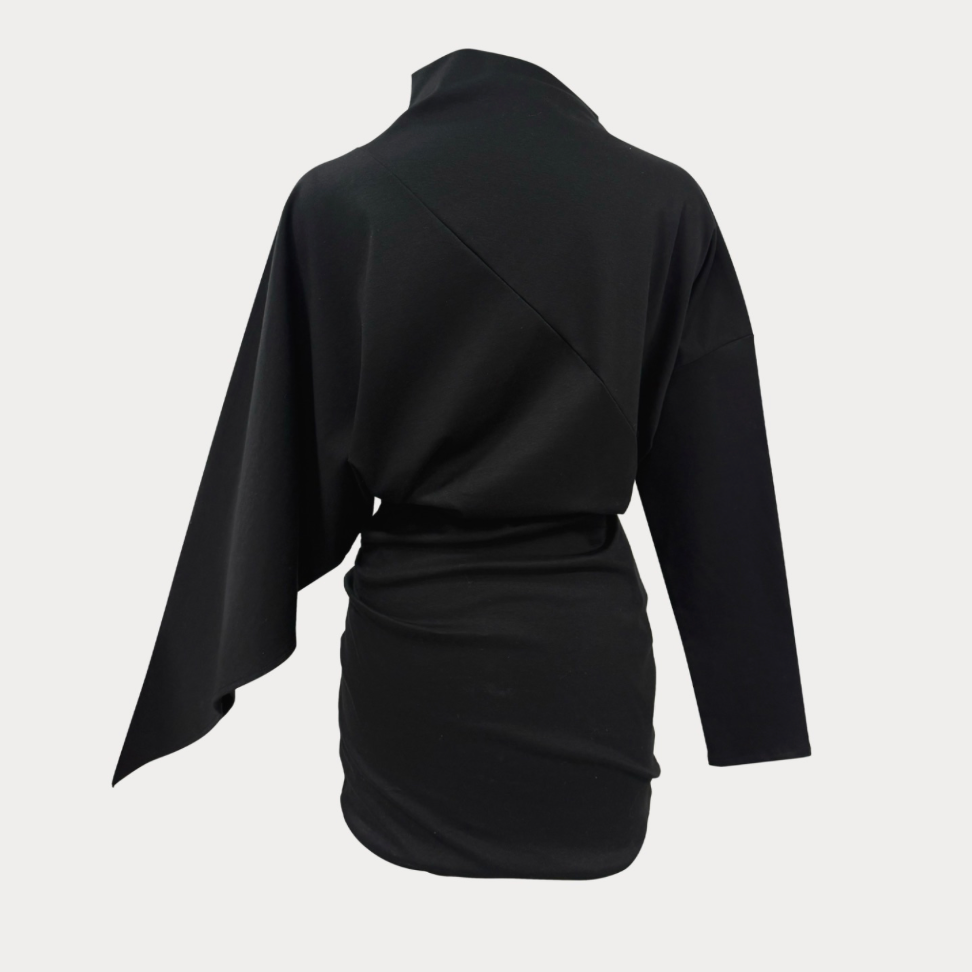 A black long-sleeve wrap-style top with a high mock neck, shown from the back on a light gray background.