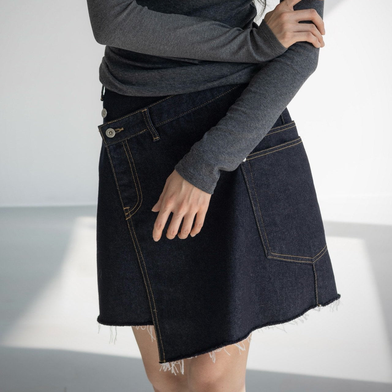 The Asymmetric Wrap Denim Skirt