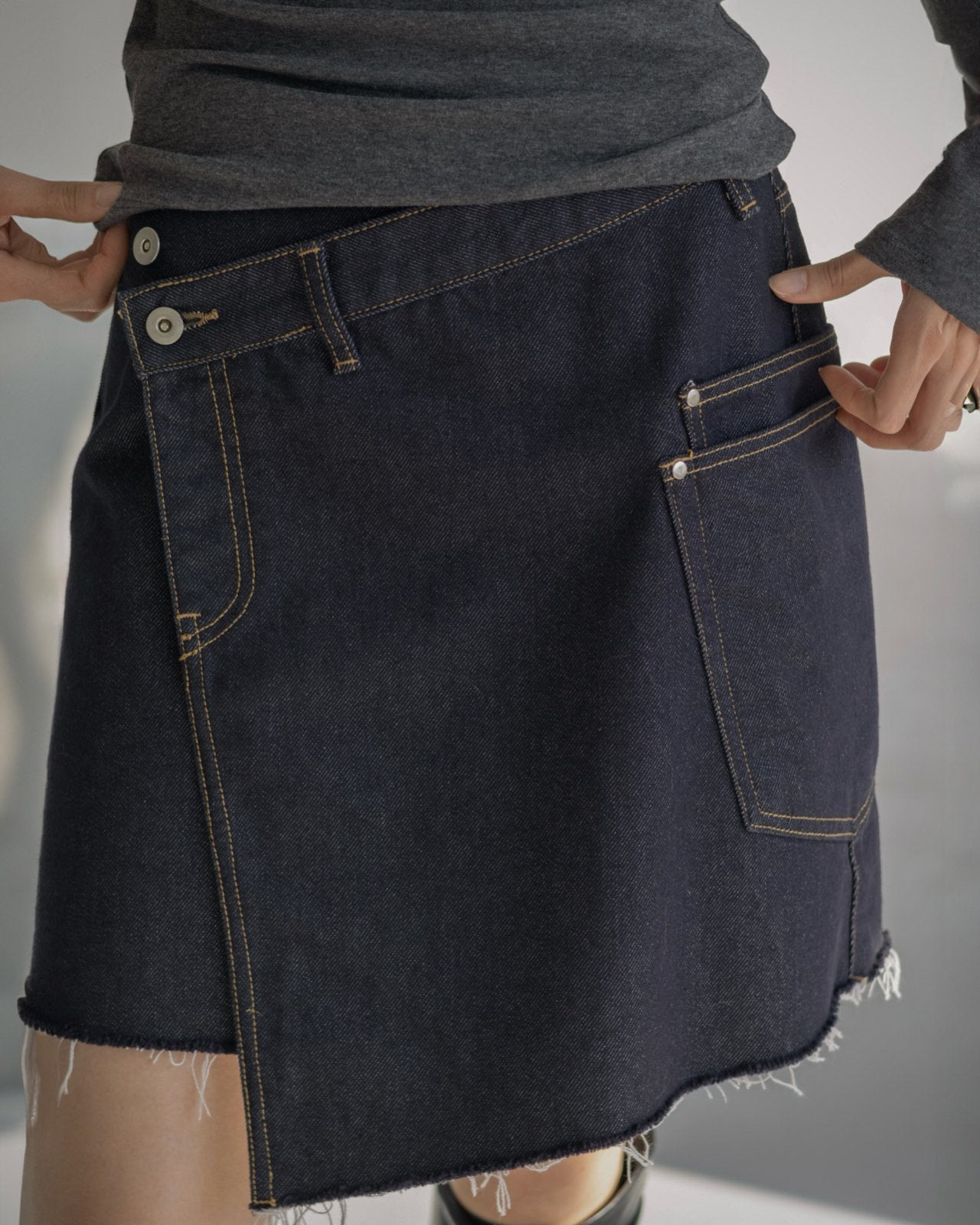 The Asymmetric Wrap Denim Skirt